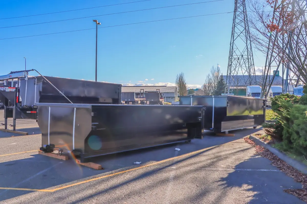 Roll-off dumpster ready for waste disposal at job site for Commercial Dumpster Rental in Breaux Bridge